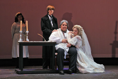 Dustin Digman as Marius with Fantine, Jean Valjean, and Cosette Dustin Digman as Marius